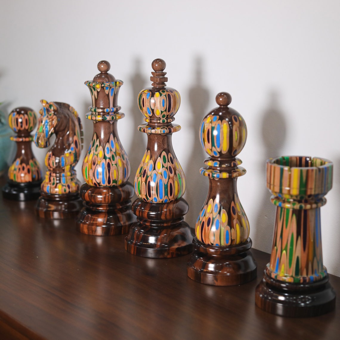 Medieval style chess pieces with a castle