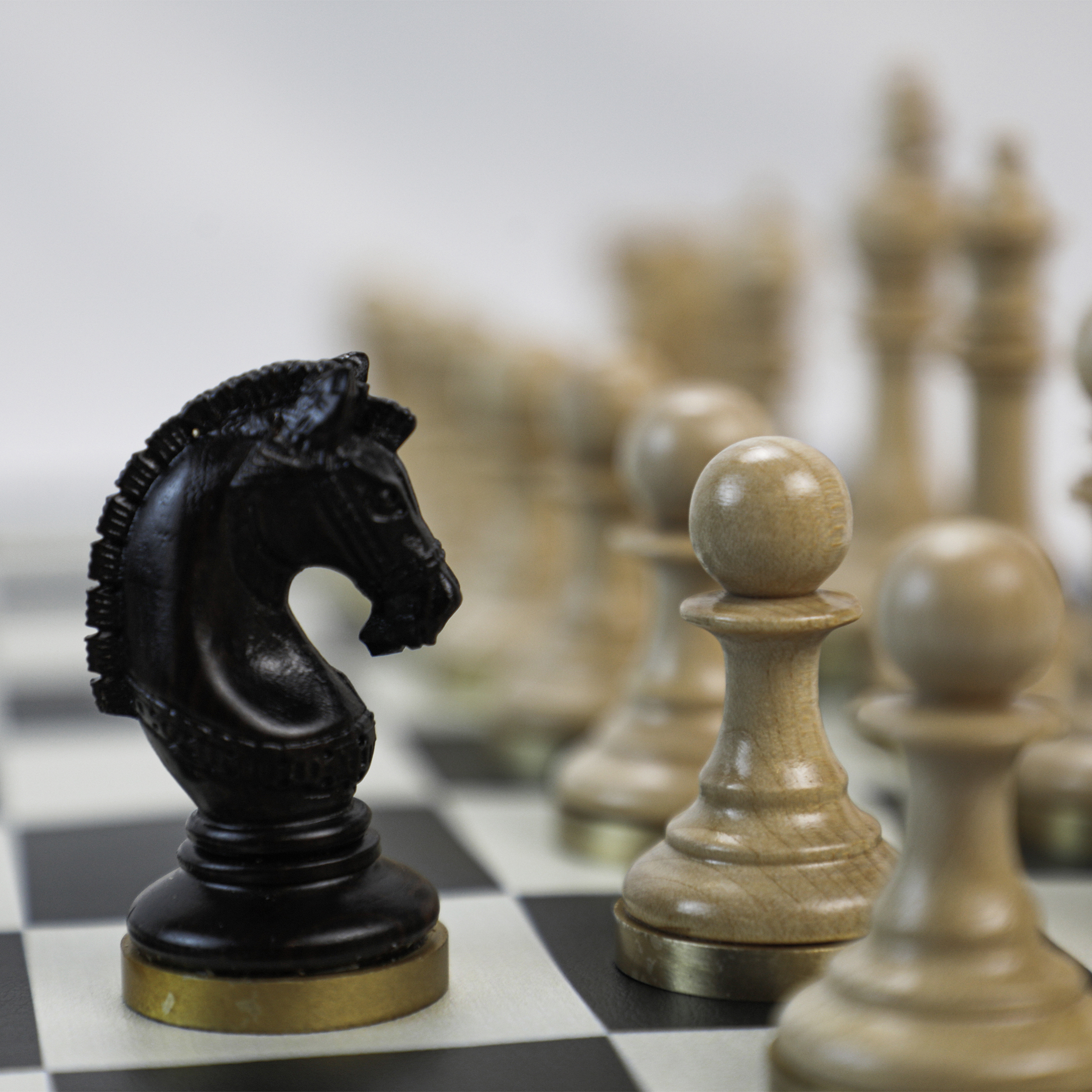 Premium Photo  Chess pieces on dark with red backlight close up